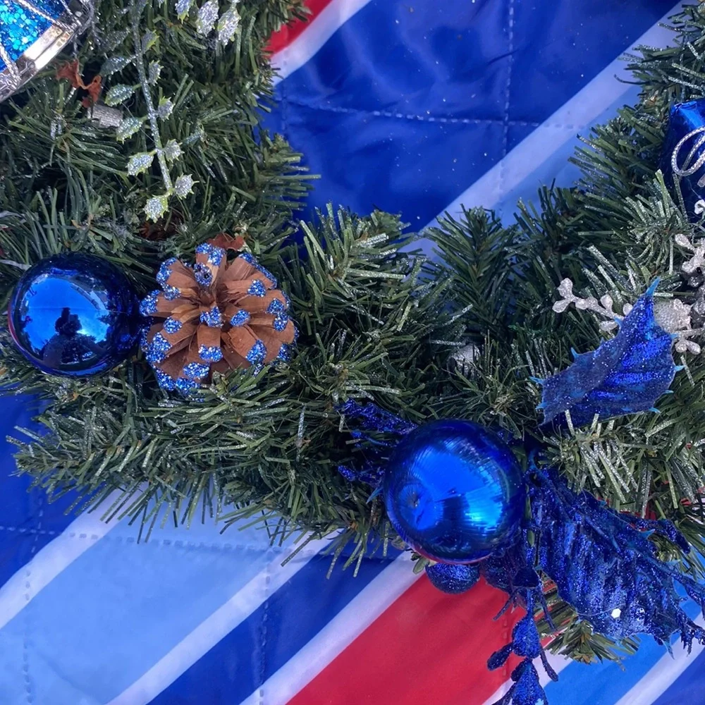 Evergreen Wreath Trimmed with silver and blue and pine ones